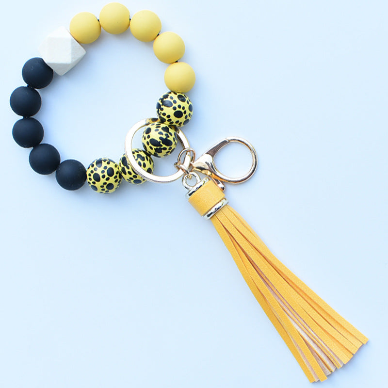 Wholesale Colorful leopard print silicone beaded bracelet keychain PU tassel pendant